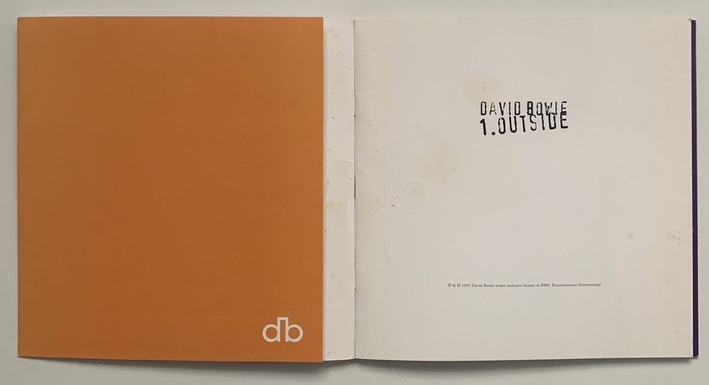 David Bowie – 1. Outside [The Nathan Adler Diaries: A Hyper Cycle] (CD/Livro usado)