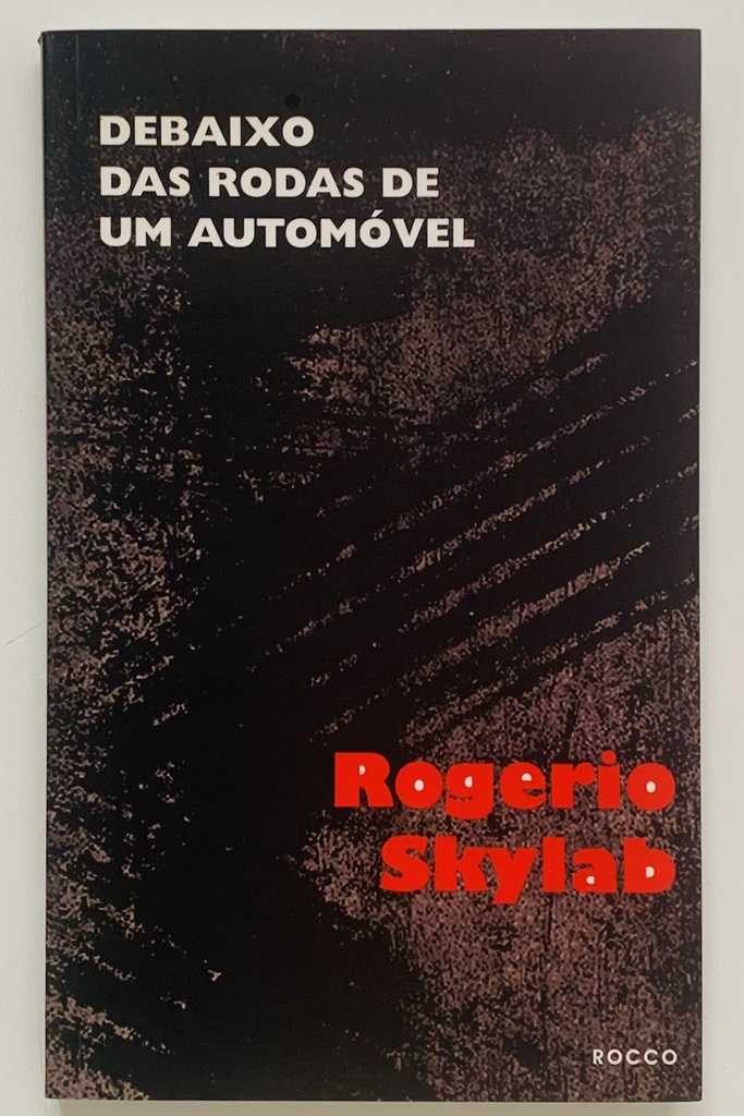 Rogério Skylab - Debaixo das Rodas de um Automóvel (Livro semi novo)